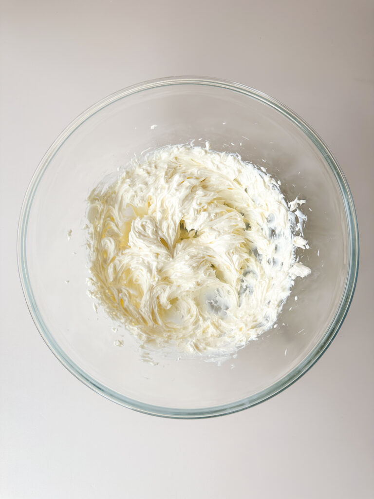 Cream the butter and cream cheese