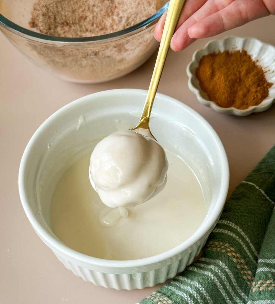 Dip half the donut holes in the glaze